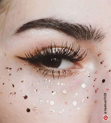 Face with golden glitter flecks