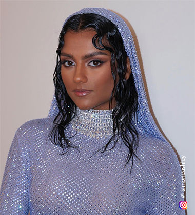 Simone Ashley sporting a wet hair look