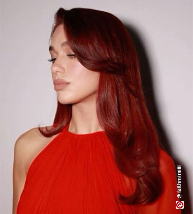 Dua Lipa in a red dress