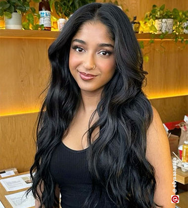 MAitreyi Ramakrishnan in  a black tank top