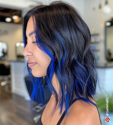 side profile of a woman with blue higlights