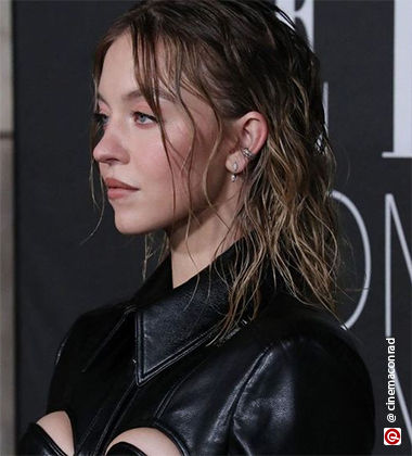 Sydney Sweeney with wet hair waves
