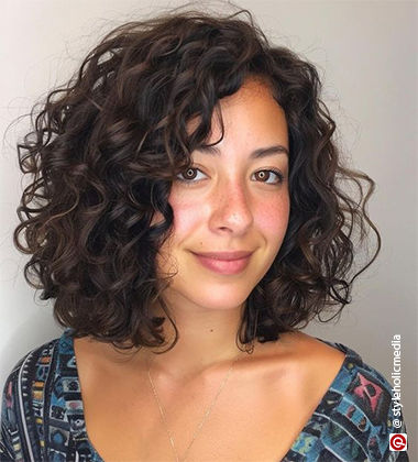 woman with side parting and a pendant around her neck