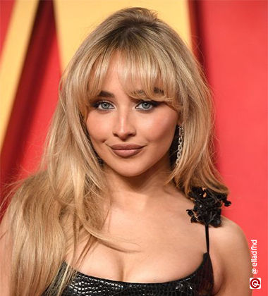 Sabrina CArpenter with bangs in an award show