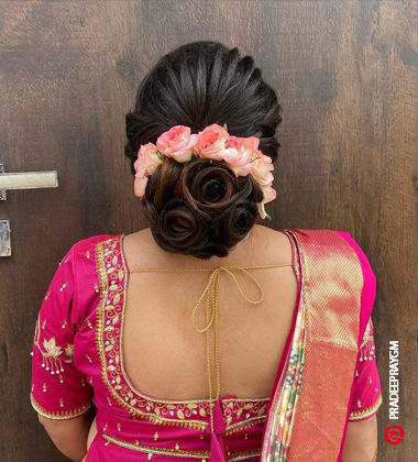 Defined Rosettes Juda Hairstyle