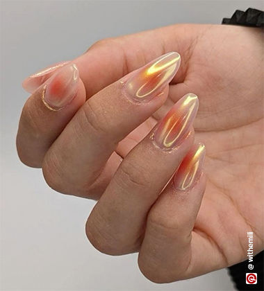 ornage-ish chrome nails