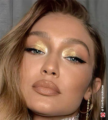 Gigi Hadid with golden eye look
