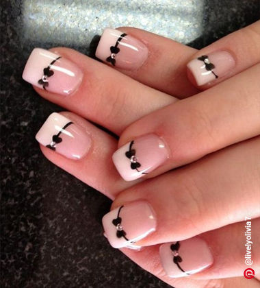 french nails with a design - coquette core 