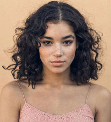 Center Parted Curly Hairstyle
