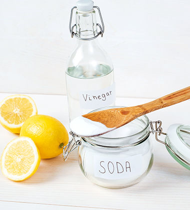 baking soda jar wooden spoon on