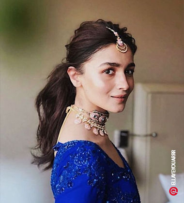 Wispy Ponytail hairdo for straight hair seen Alia Bhatt
