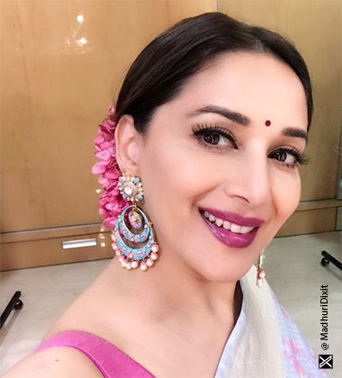 Full Bun Hairstyle With Multicoloured Gajra - Madhuri Dixit Nene