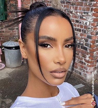 hairstyle ideas for straight hair with a slick back bun
