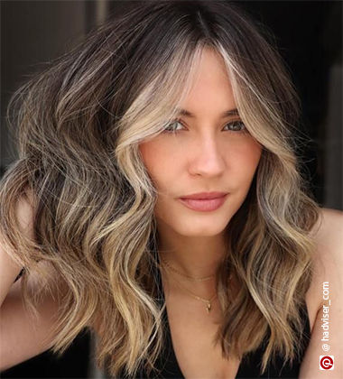 close up of a woman with hair on her face
