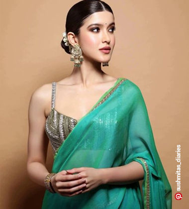 simple hairstyle for saree - low bun