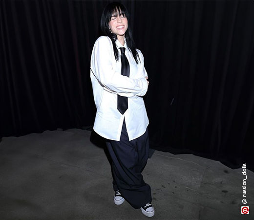 Billie Eilish in an oversized white shirt
