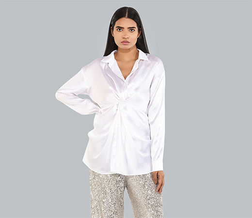 White shirt and sequined trousers