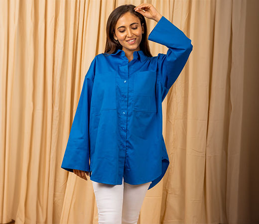 Blue shirt and white trousers