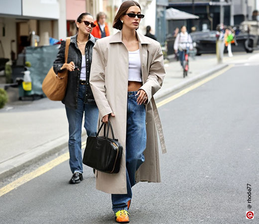 Hailey Bieber wearing a trench coat