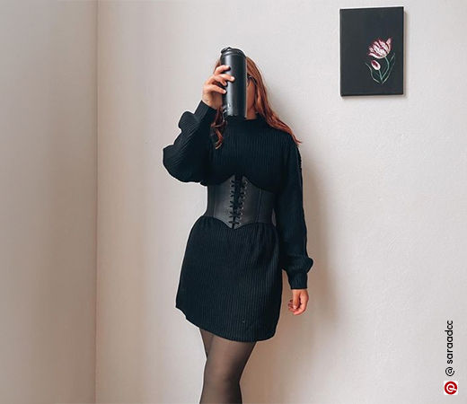 Black sweater and corset belt