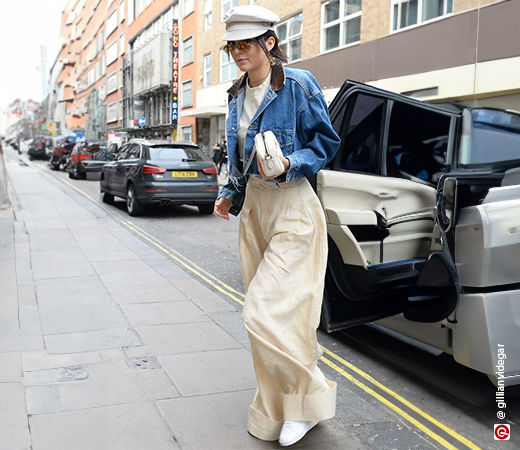 Kendall Jenner wearing a denim jacket with oversized trousers