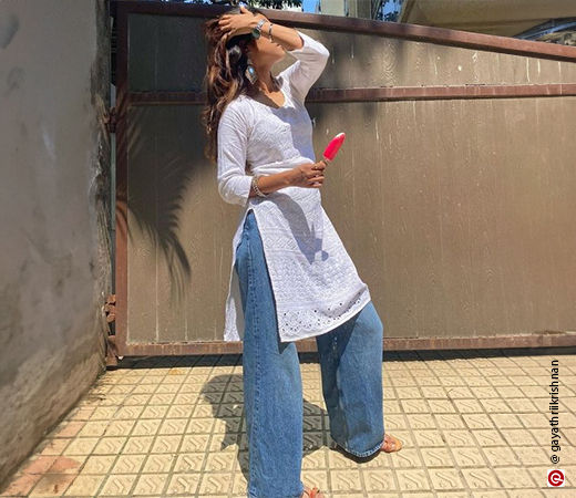 Woman wearing a chikankari kurta with baggy jeans