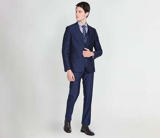 Man wearing Arrow navy tailored regular fit suit