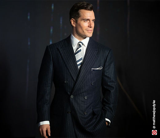 Henry Cavil wearing a double-breasted suit
