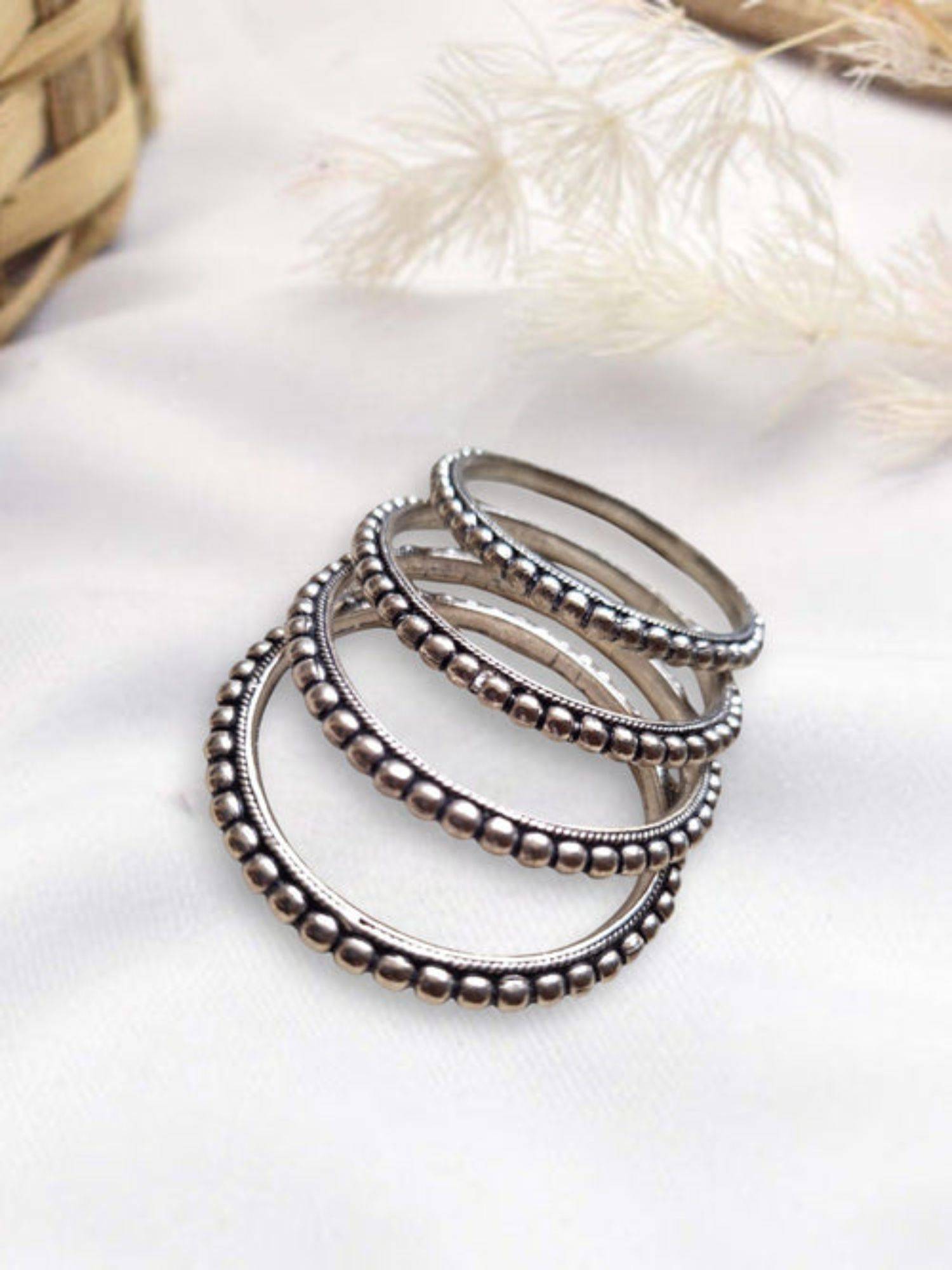 XAGO Le Anoma Set Of 4 Silver Plated Oxidized Bangles