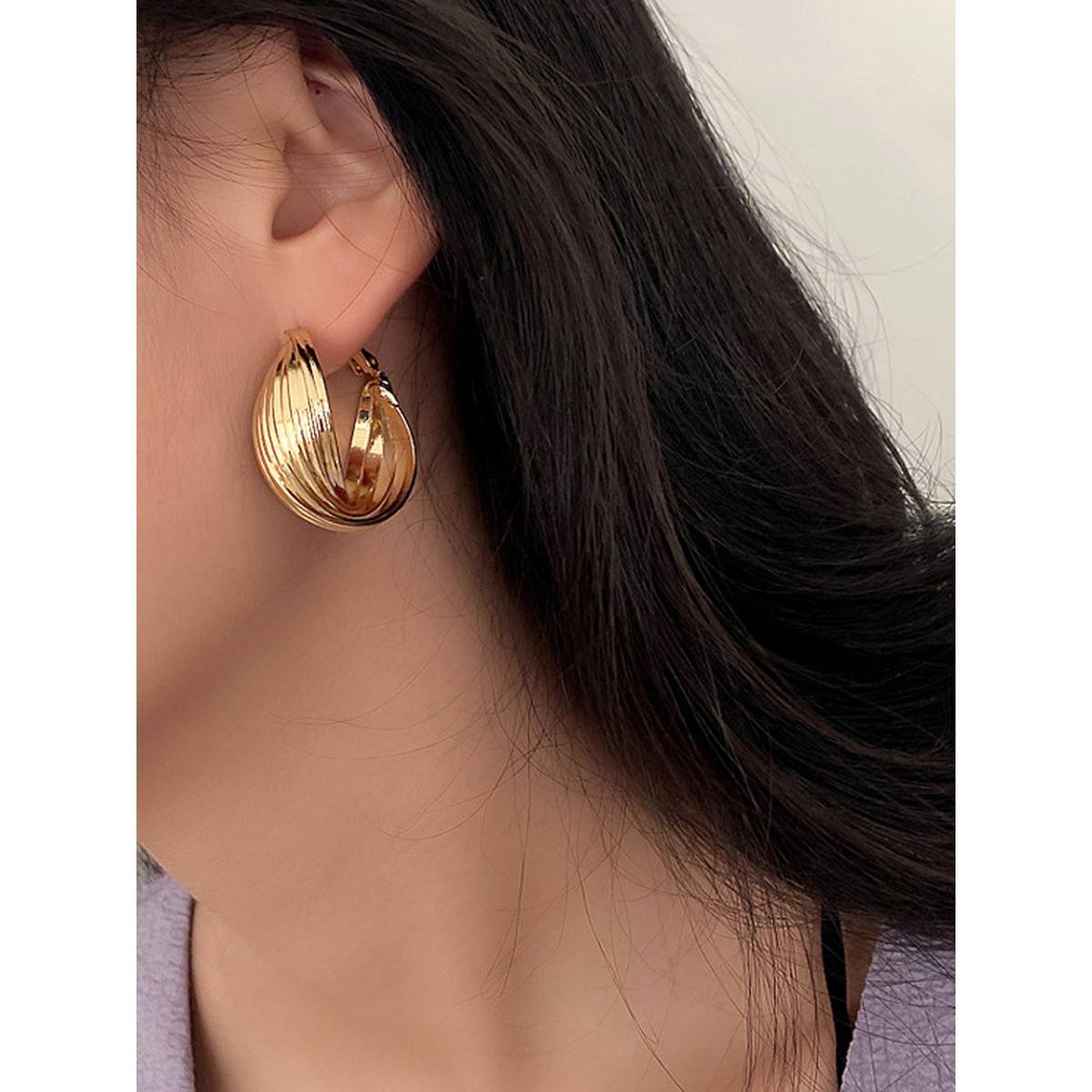 Yellow Chimes Glod Toned Twisted Hoop Earrings