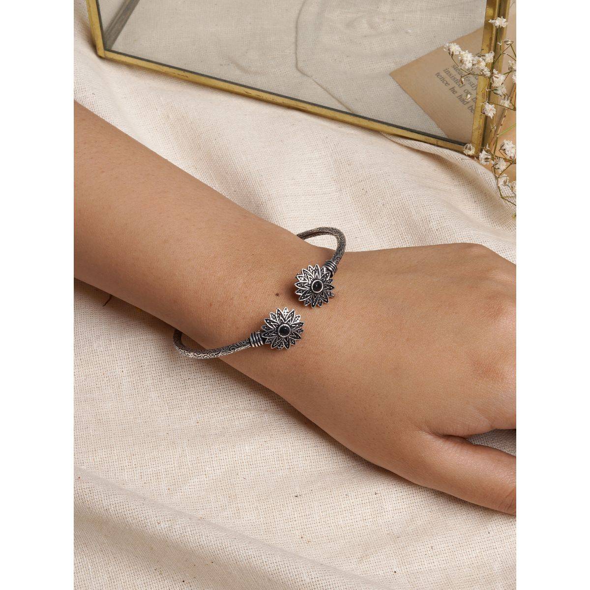 Teejh by Joker and Witch Manju Silver Oxidised Floral Bracelet for Women