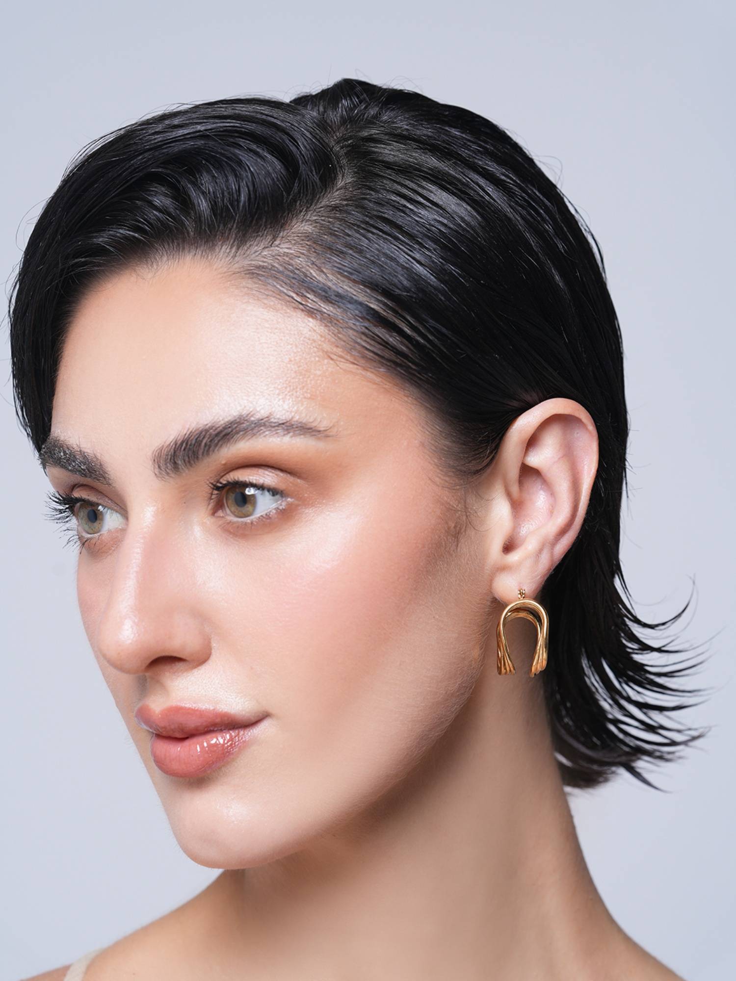 CAO JEWELLERY Gold Twisted Hollow Stainless Steel Earrings