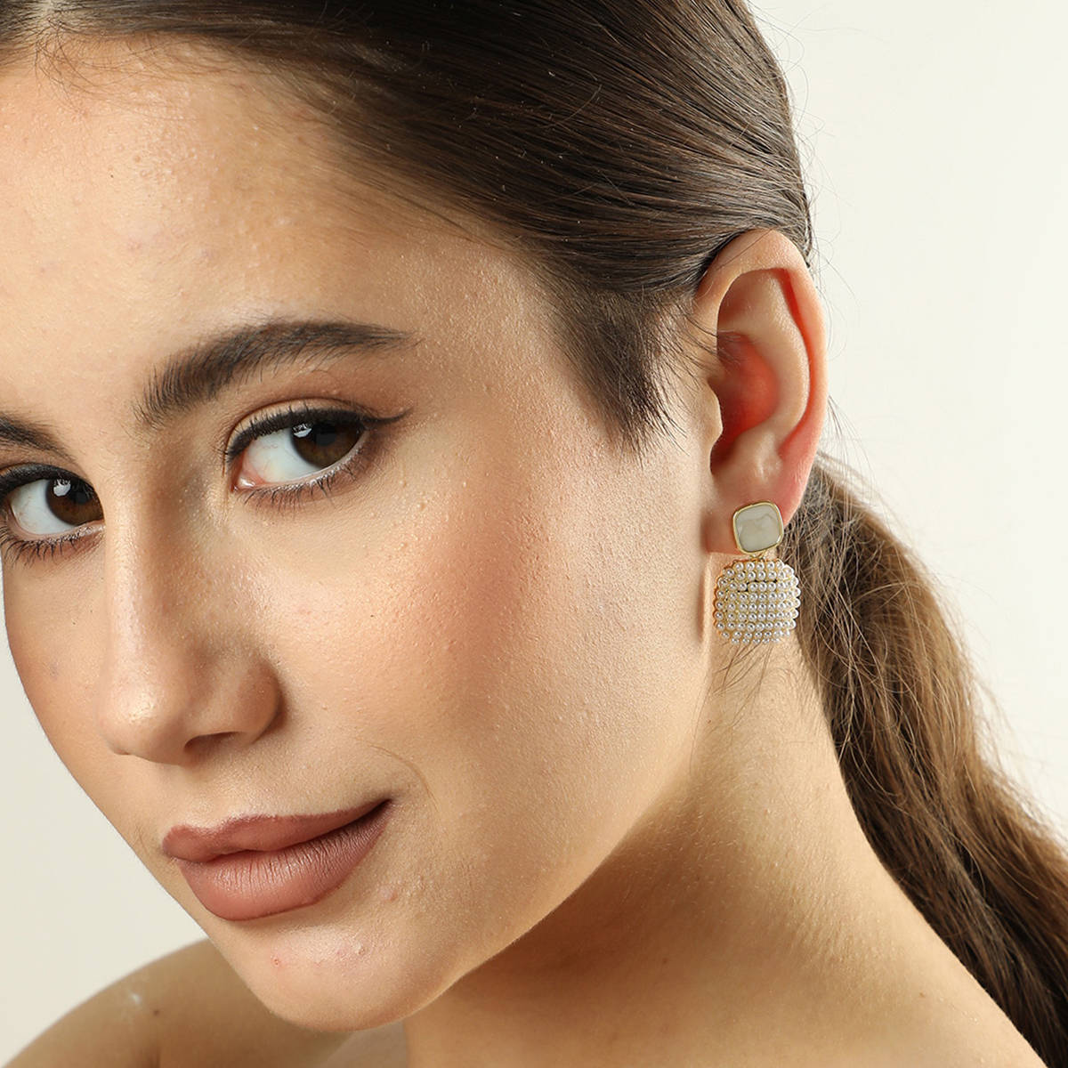 SOHI Gold Toned Gold Plated Contemporary Stone Drop Earrings