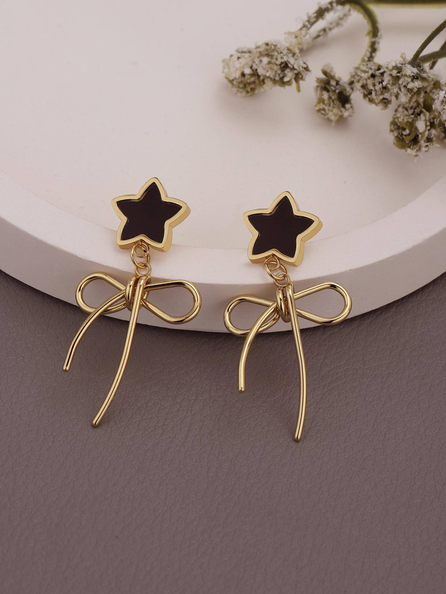 Buy Carlton London 18Kt Gold Plated Star and Bow Drop Earring Online
