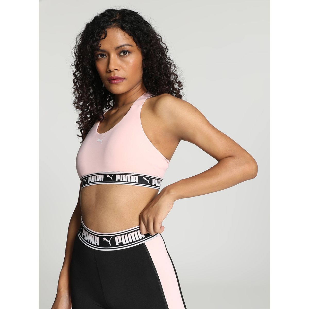 Puma Training Strong mid support sports bra in black