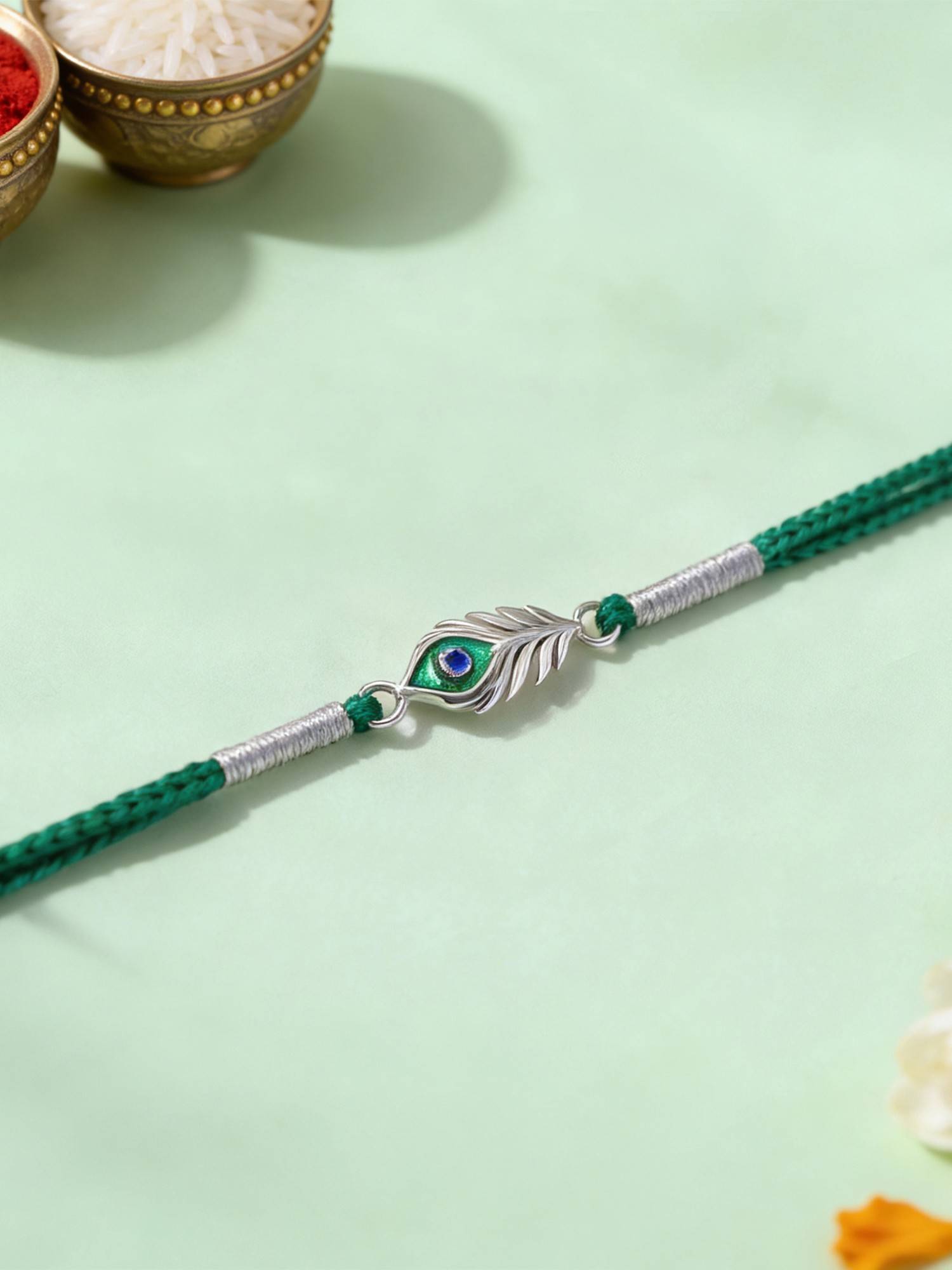 Ornate Jewels 925 Silver Rhodium Plated Mor Pankh Thread Rakhi With Roli Chawal for Brother