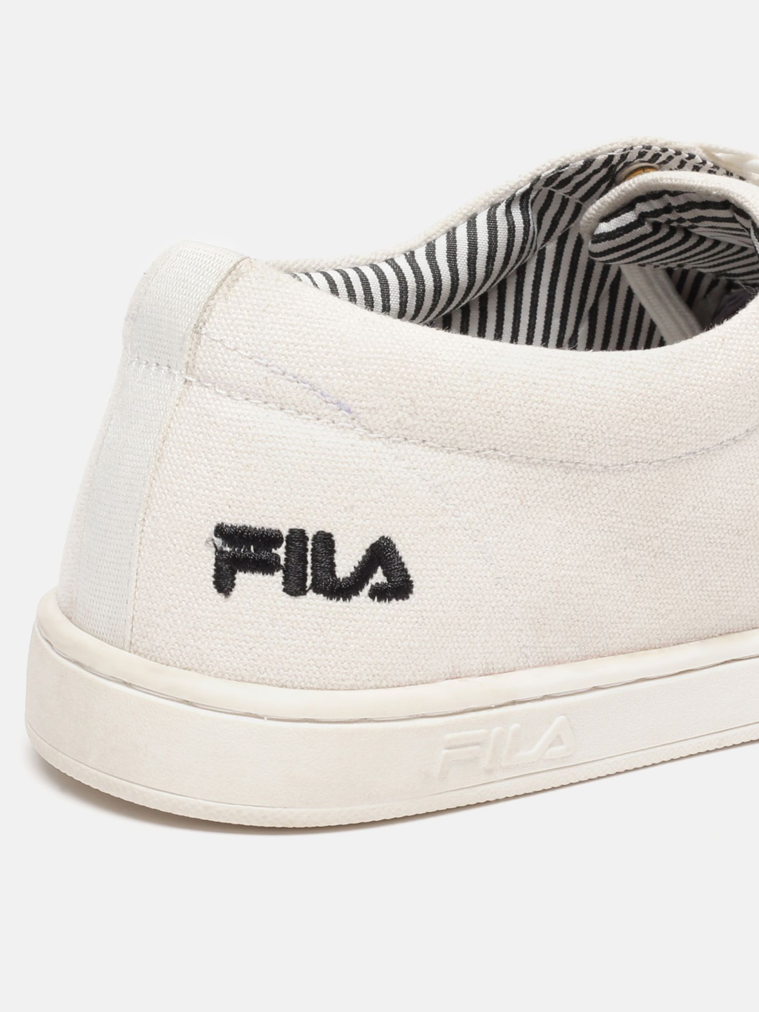 Fila white canvas clearance