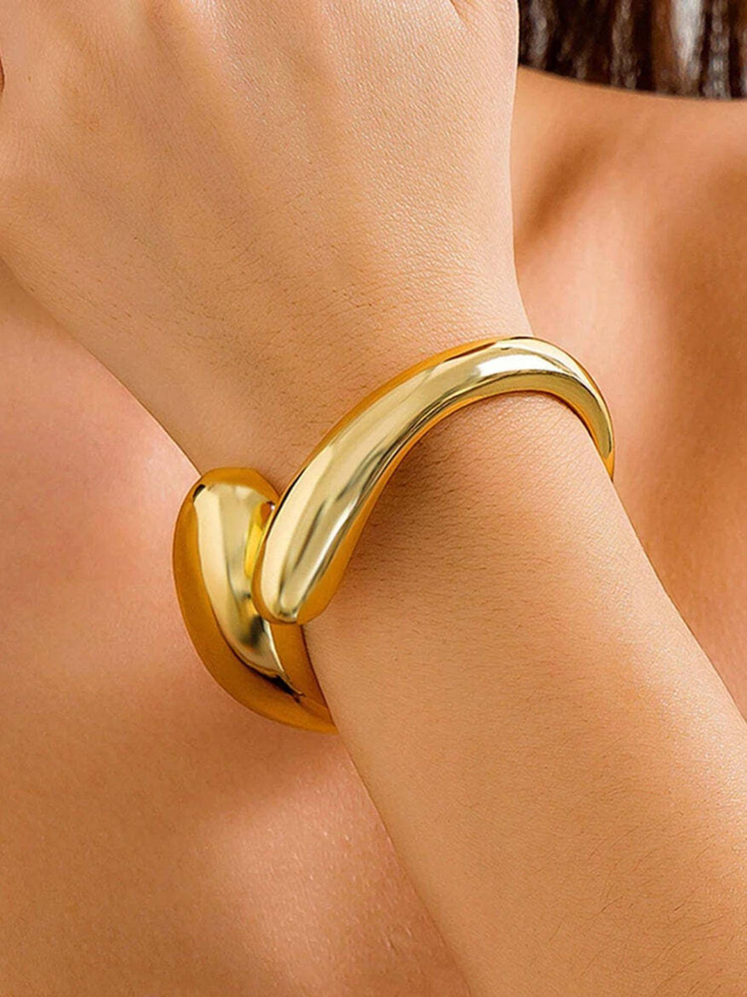 OOMPH Gold Tone Hand Cuff