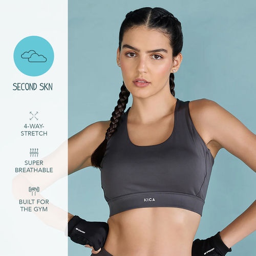 Buy Women Fashionable Strappy Sports Bra with Removable Pads online