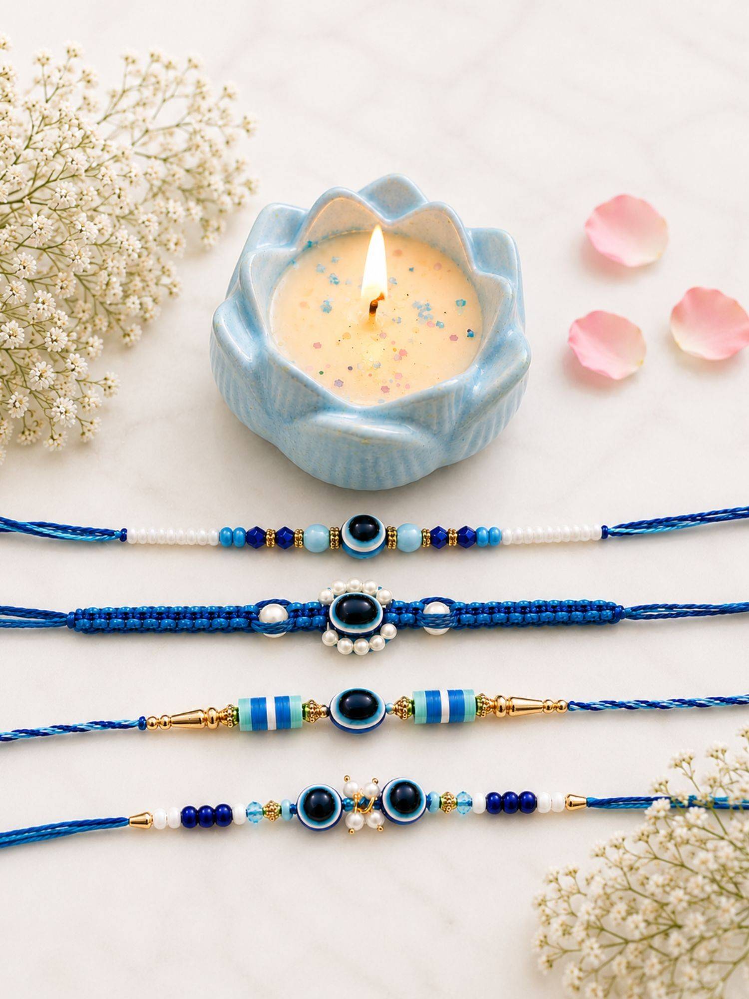 VIRAASI Multi-Color Evil Eye Rakhi Gift Set of 4 with Candle