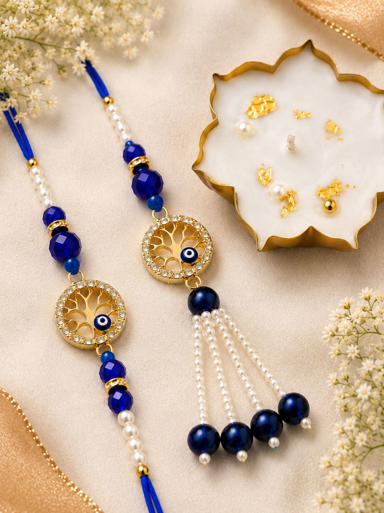 VIRAASI Blue Evil Eye Bhaiya Bhabhi Rakhi Set with Candle