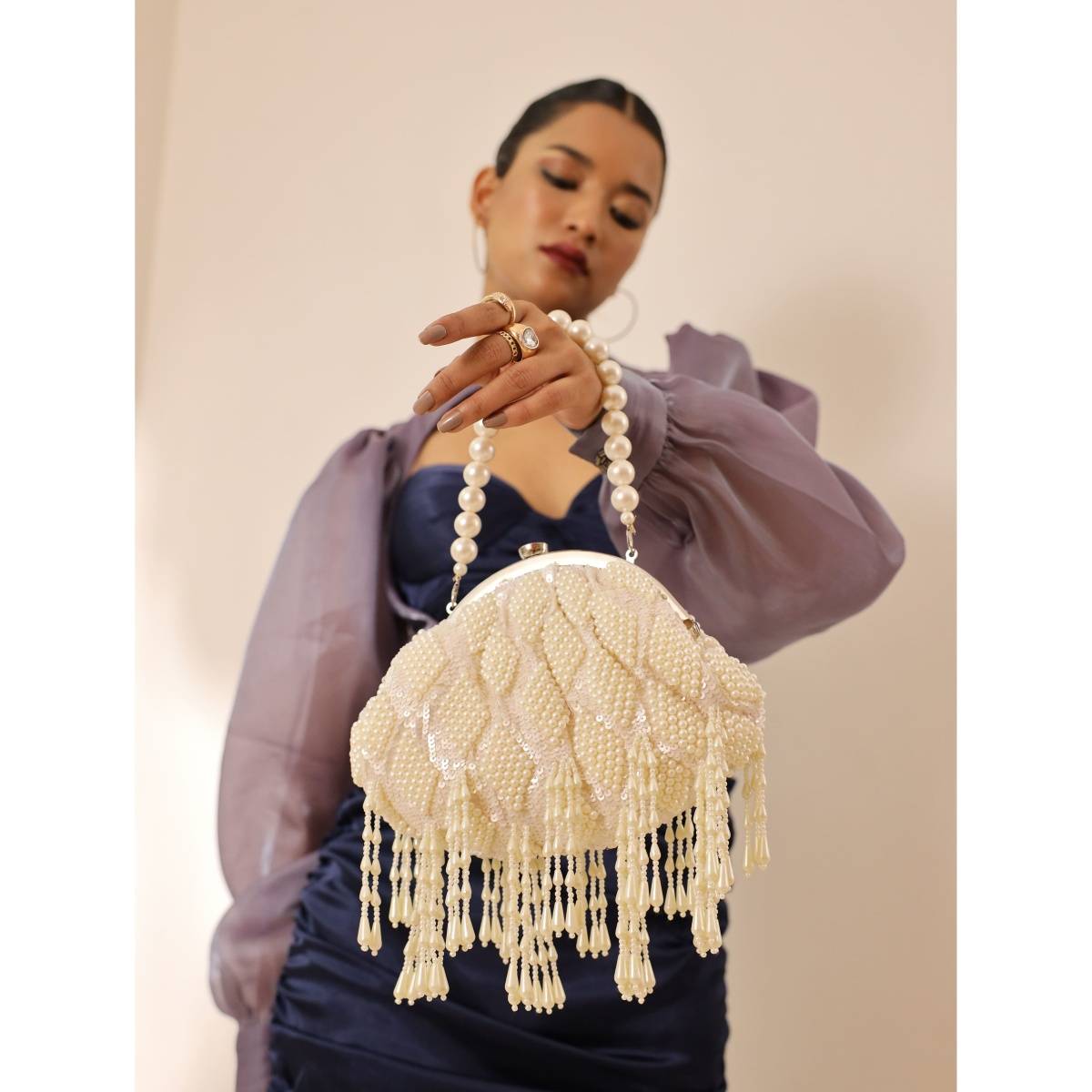 THE TAN CLAN White Sona Pearl Tasselled Clutch