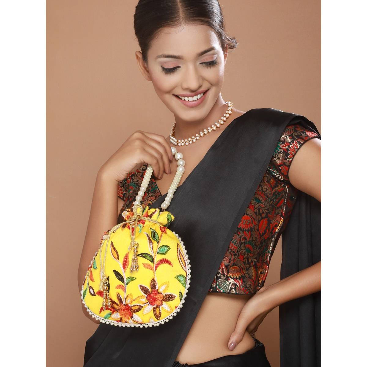 Aatmana Yellow Multi-coloured Leaf Pattern Potli Bag