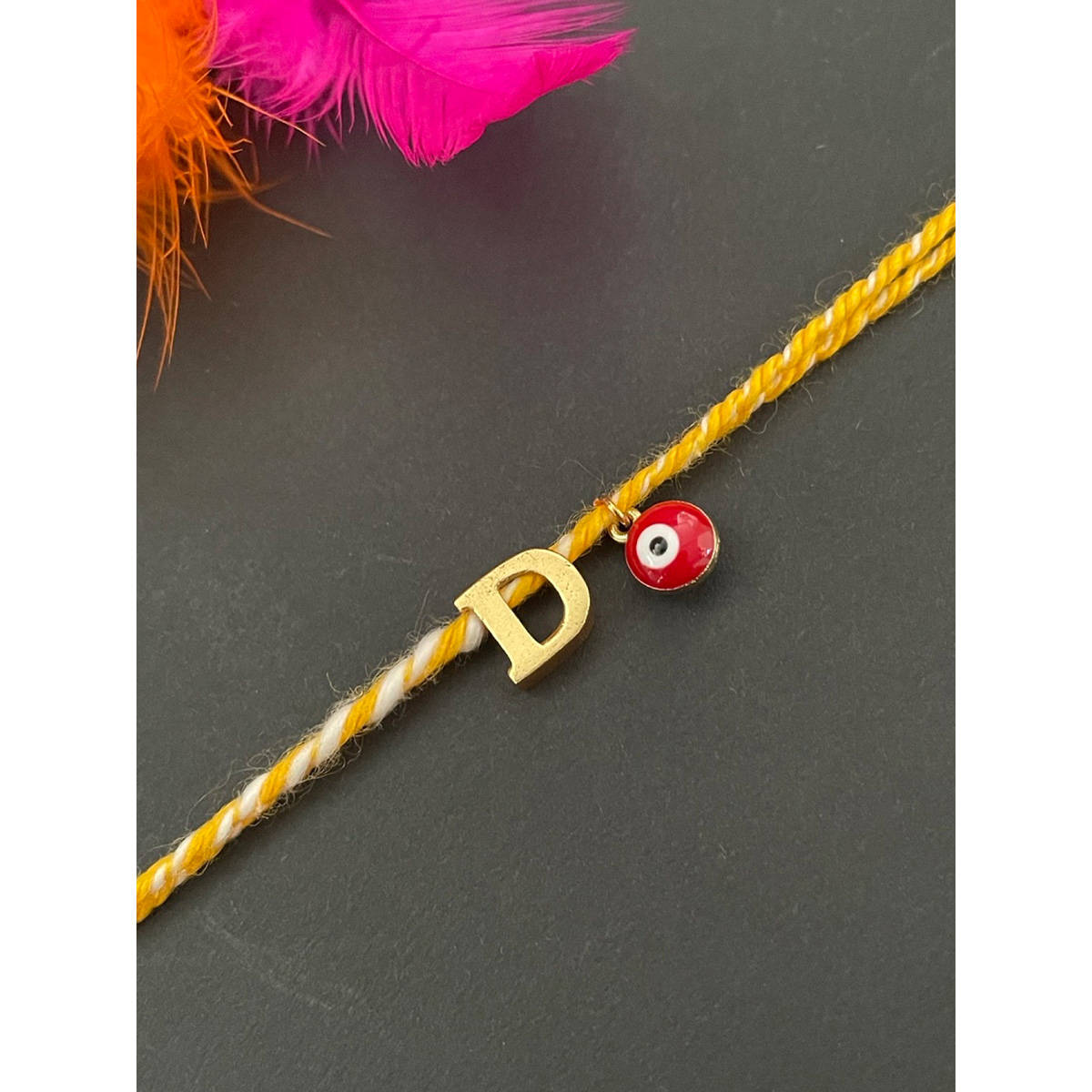 Digital Dress Room Letter "D" Initial & Red Evil Eye Rakhi