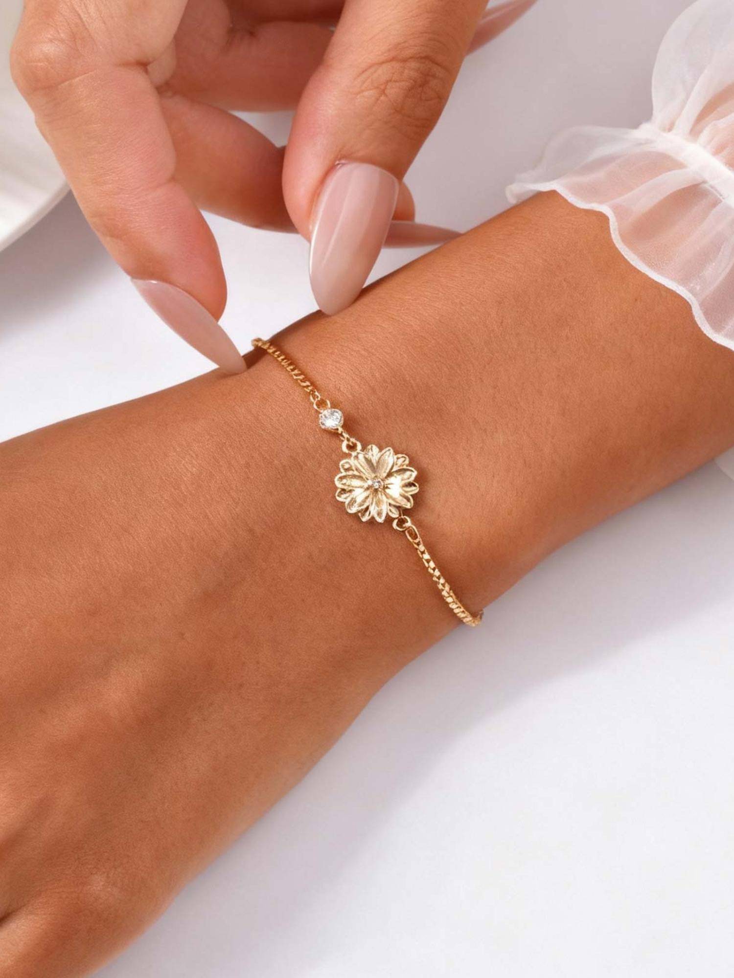 Niscka Gold Plated Floral Motif Charm Chain Bracelet