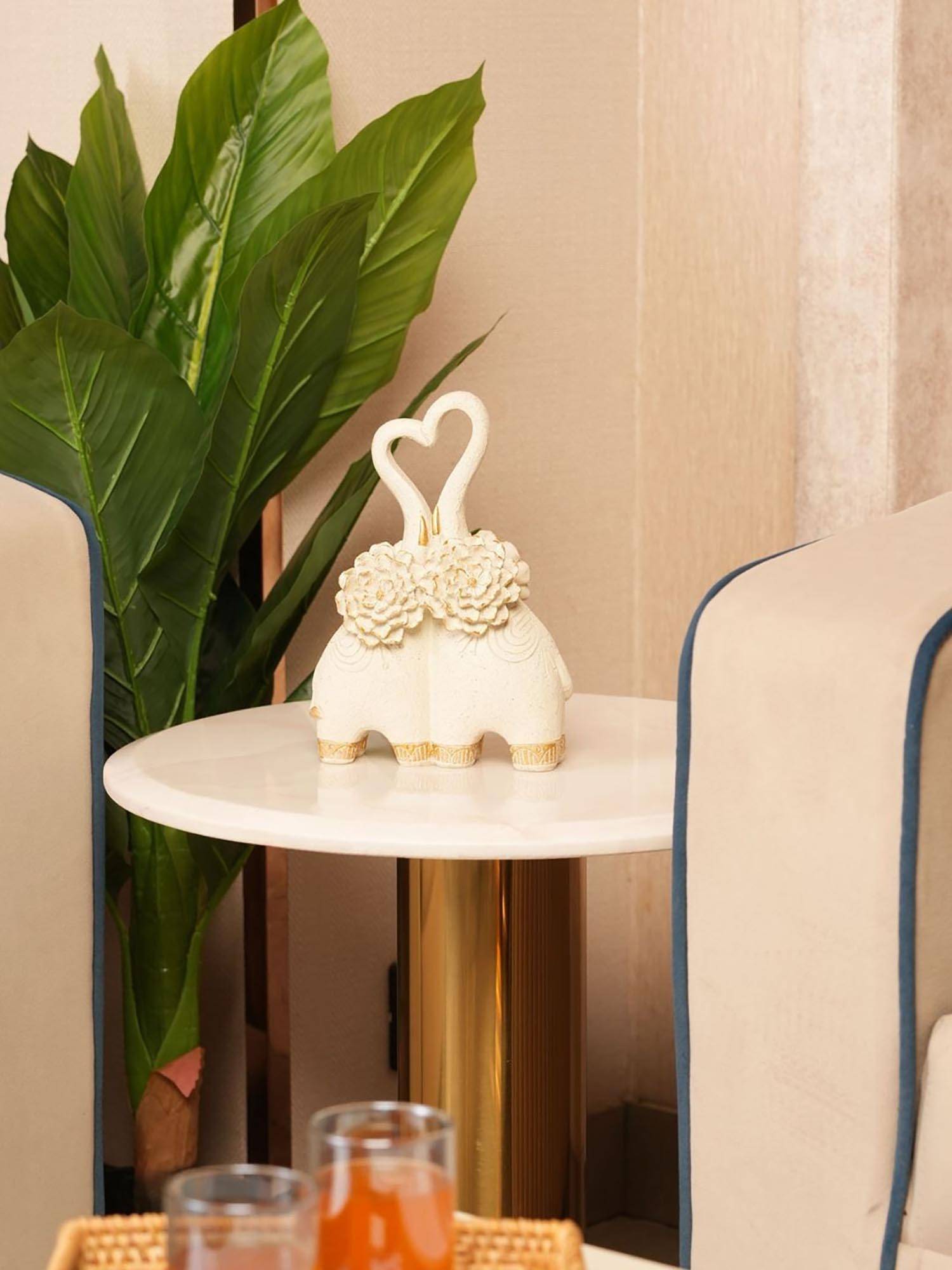 HOME 360 Off White Embracing Elephant Couple Heart Trunk Figurine