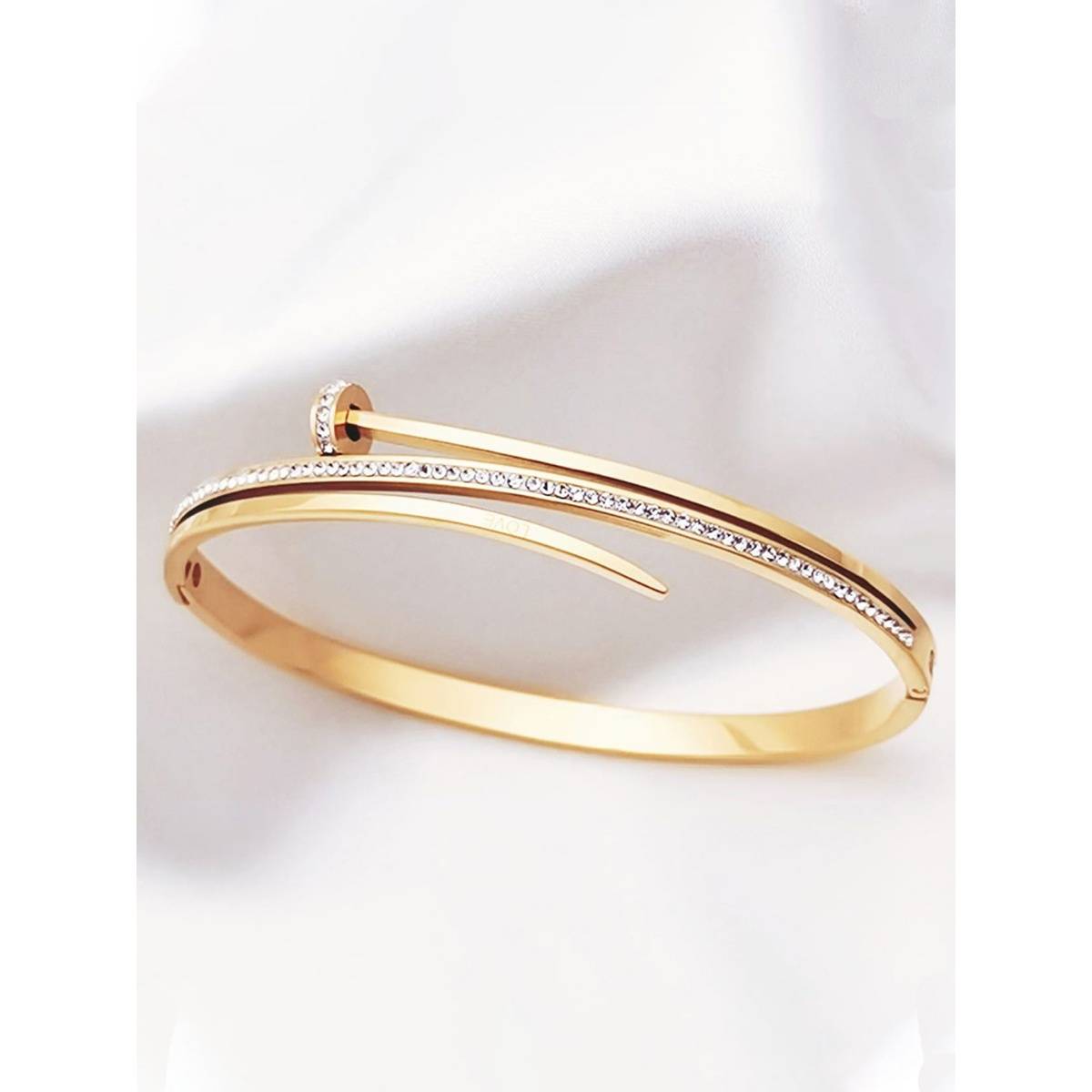 Jewels Galaxy Stainless Steel Gold Plated American Diamond Studded Nail Bracelet