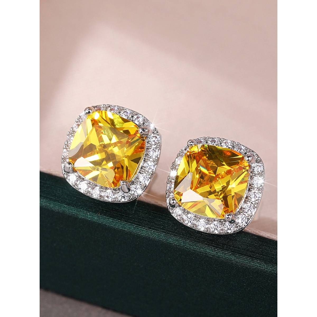 Jewels Galaxy Silver Plated American Diamond Studded Yellow Square Crushed Ice Cut Stud Earrings