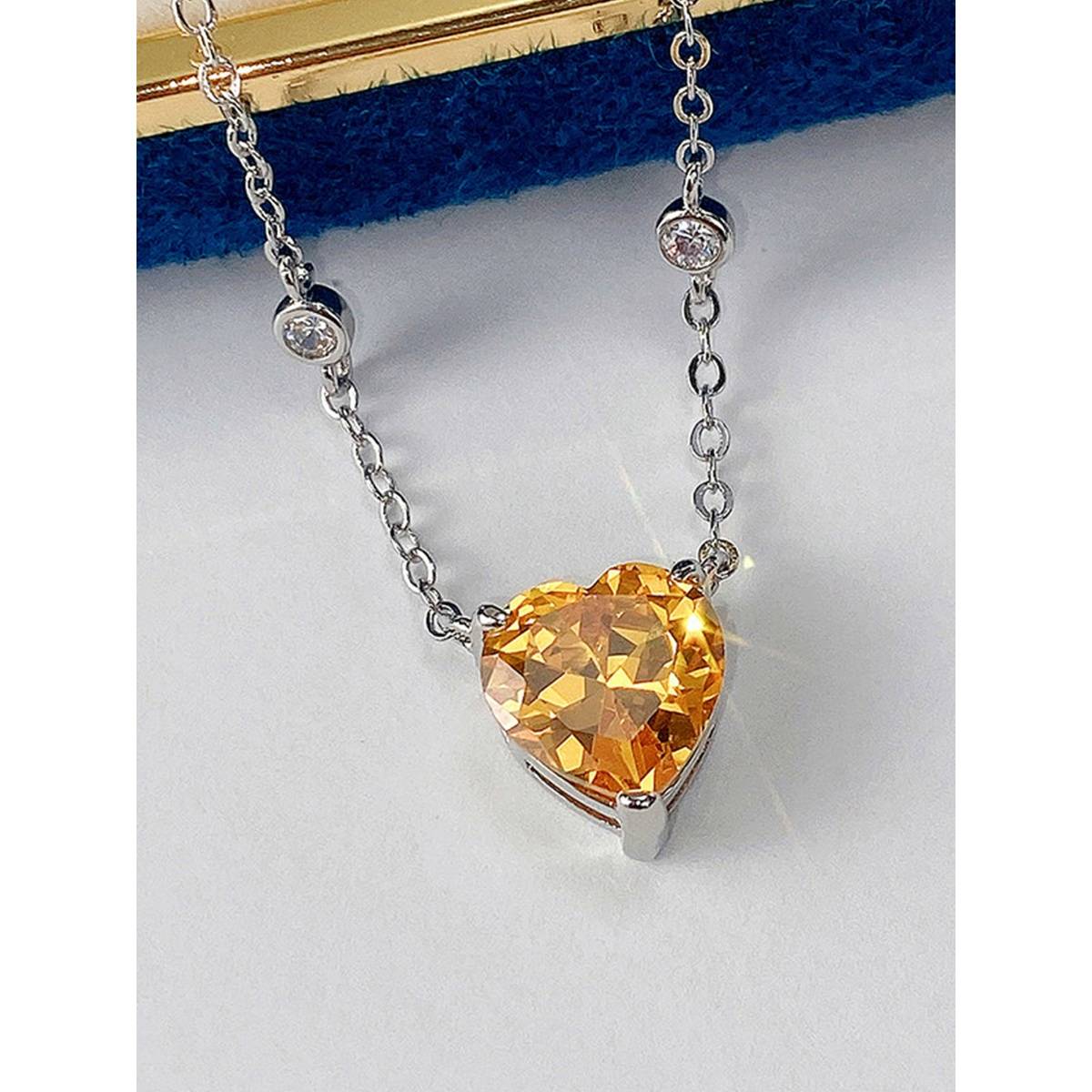 Jewels Galaxy Silver Plated American Diamond Studded Yellow Heart Shape Pendant