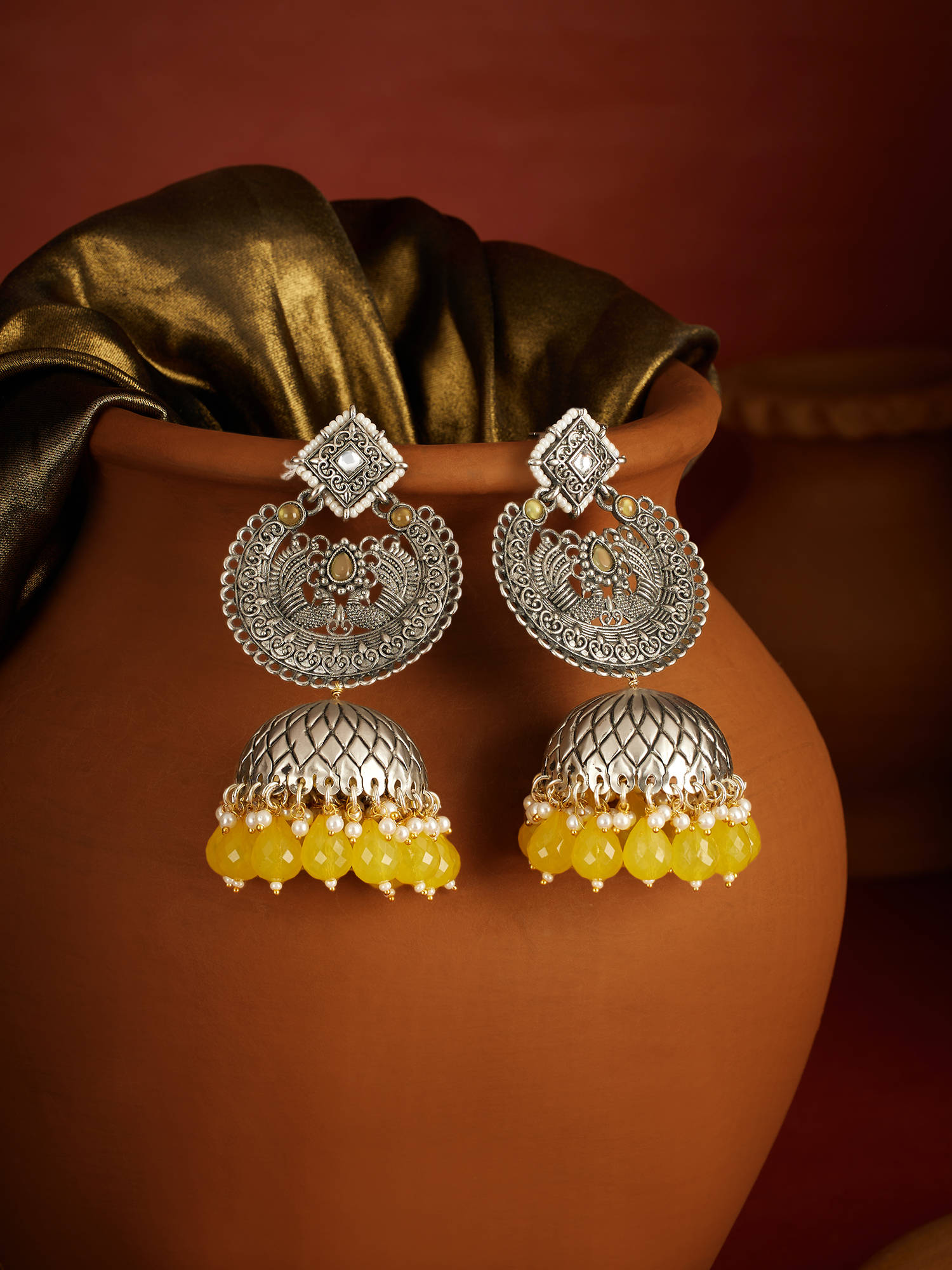 Zaveri Pearls Yellow Stones Beads Two Tone Peacock Jhumka Earrings